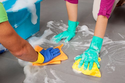 Carpet cleaning equipment and protective flooring cover in use